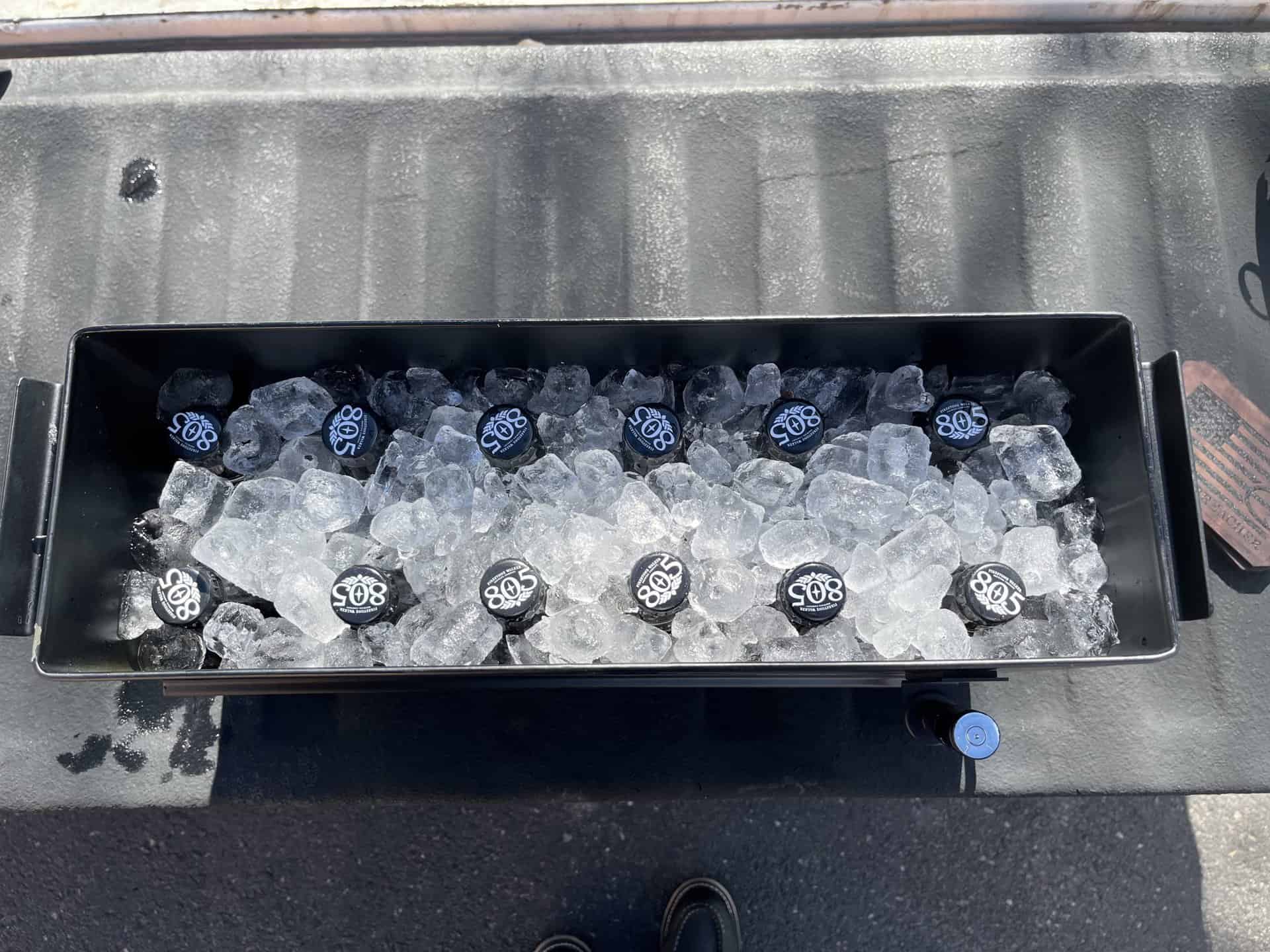 combat cooler by bottle breacher opened with cold bottles and ice