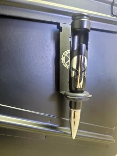.50 caliber once fired sniper bullet - with punisher logo